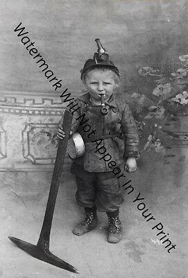 STRANGE ODD SPOOKY FREAKY CREEPY WEIRD Smoking Boy Miner Kid Child VINTAGE PIC