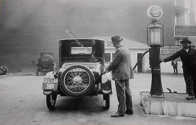 A83 Man Pumping Gas Antique Car Gas Pump VINTAGE PHOTO WEIRD Pic Image